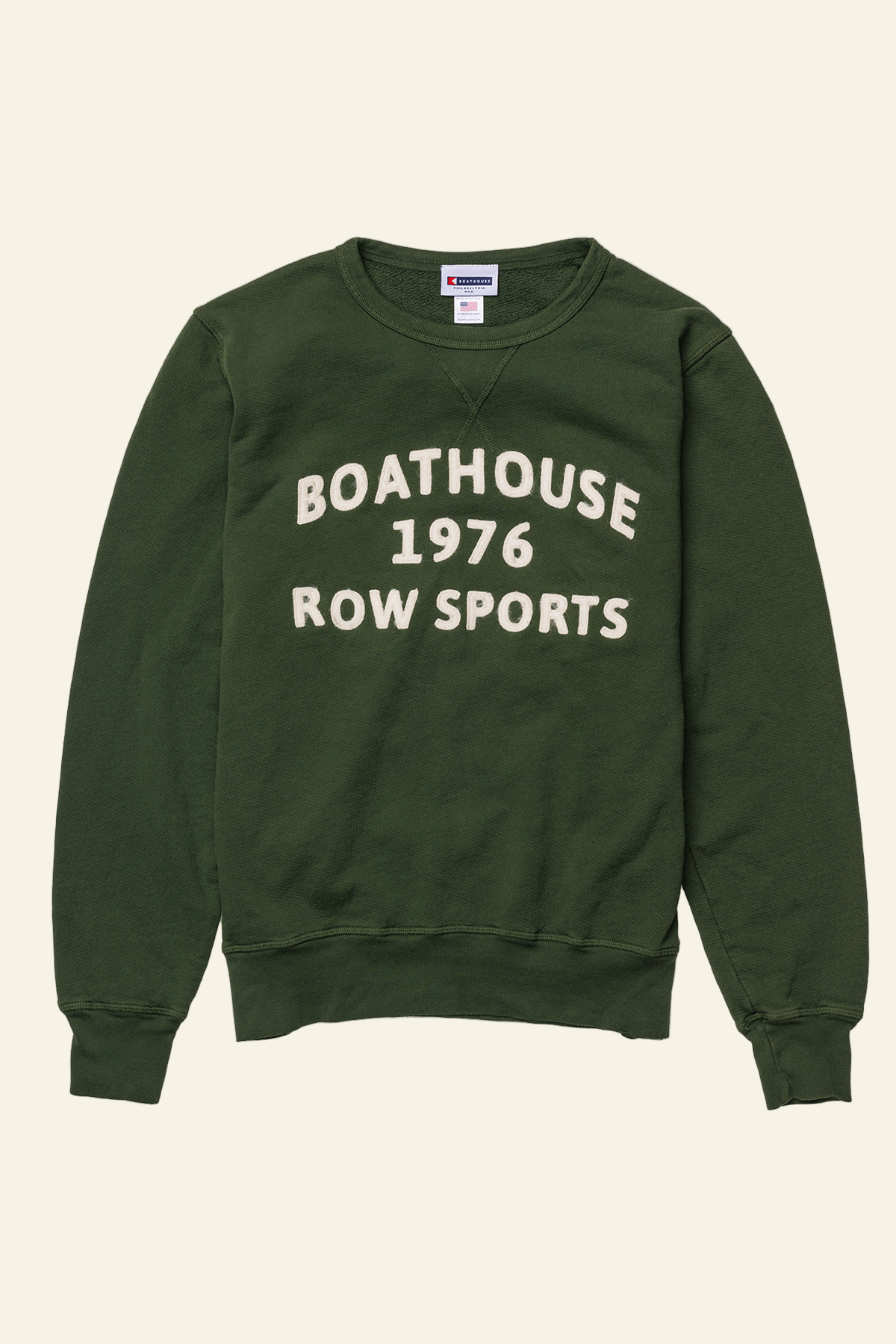 Green sweatshirt with &