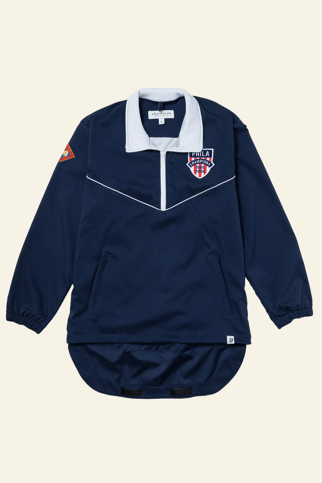 Navy blue sports jacket with white collar and logos on a white background