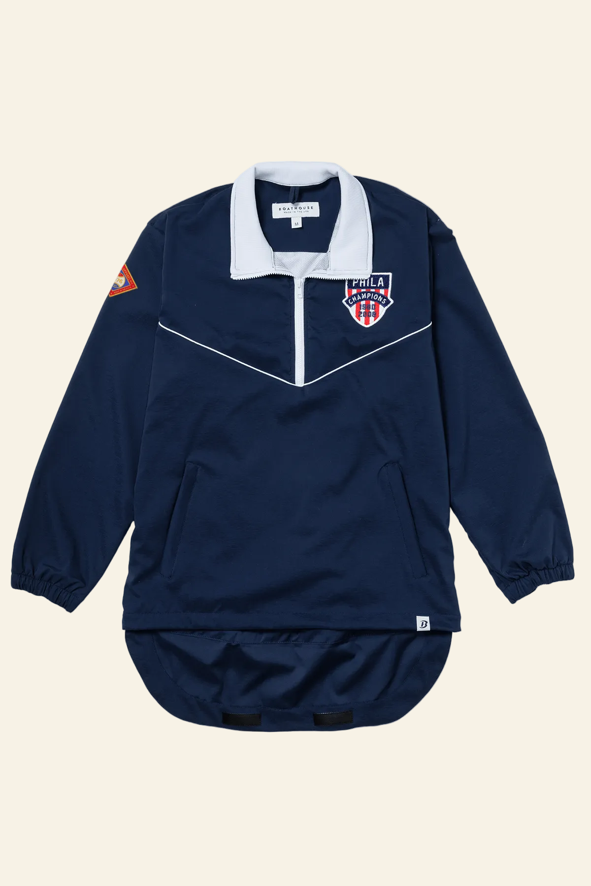Navy blue sports jacket with white collar and logos on a white background