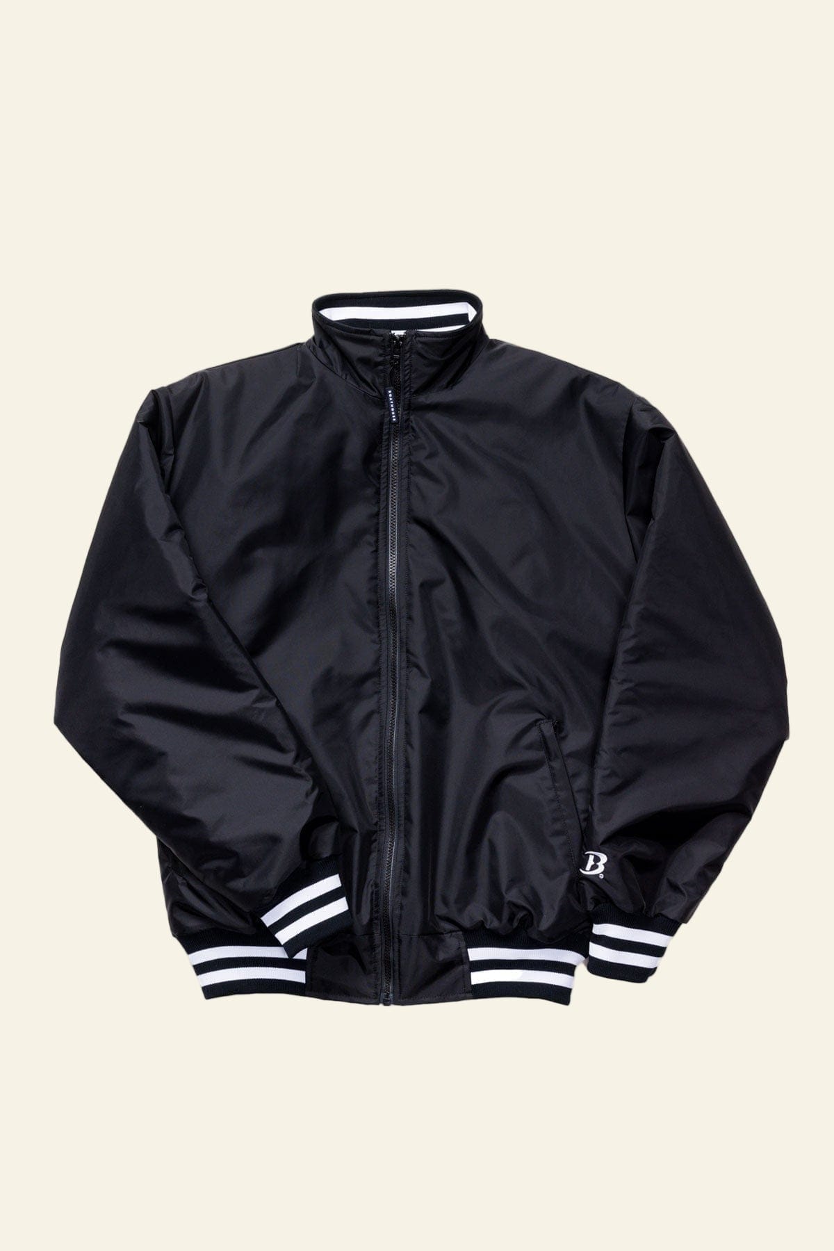 Black jacket with white stripes on cuffs and hem on a white background