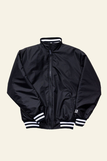 Black jacket with white stripes on cuffs and hem on a white background
