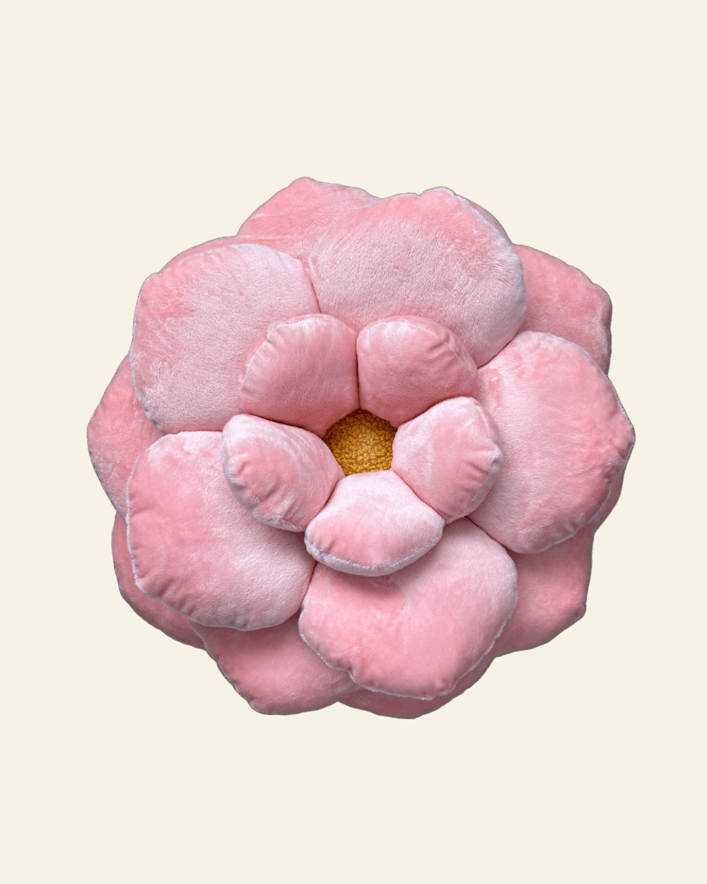 Pink flower-shaped pillow on a beige background