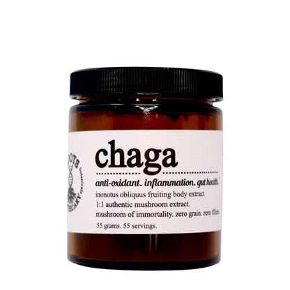 Jar of chaga mushroom extract on a white background