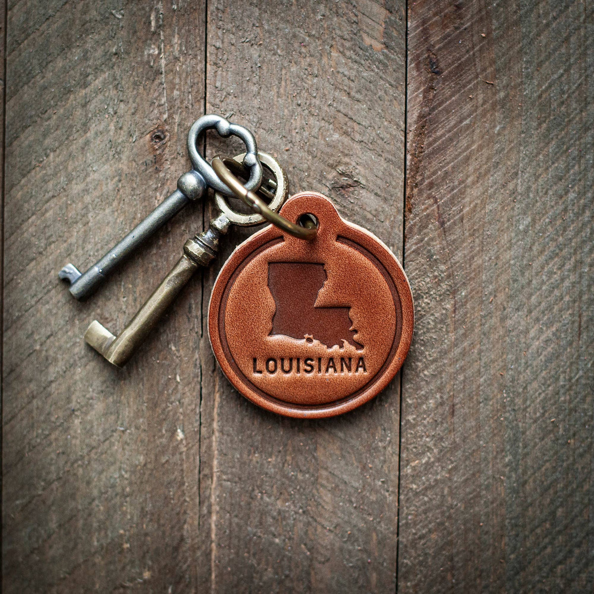 Louisiana State Silhouette Leather Keychain Circle