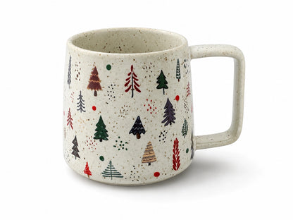 A speckled ceramic mug with a handle, decorated with a pattern of small stylized Christmas trees in various colors on a cream-colored background.