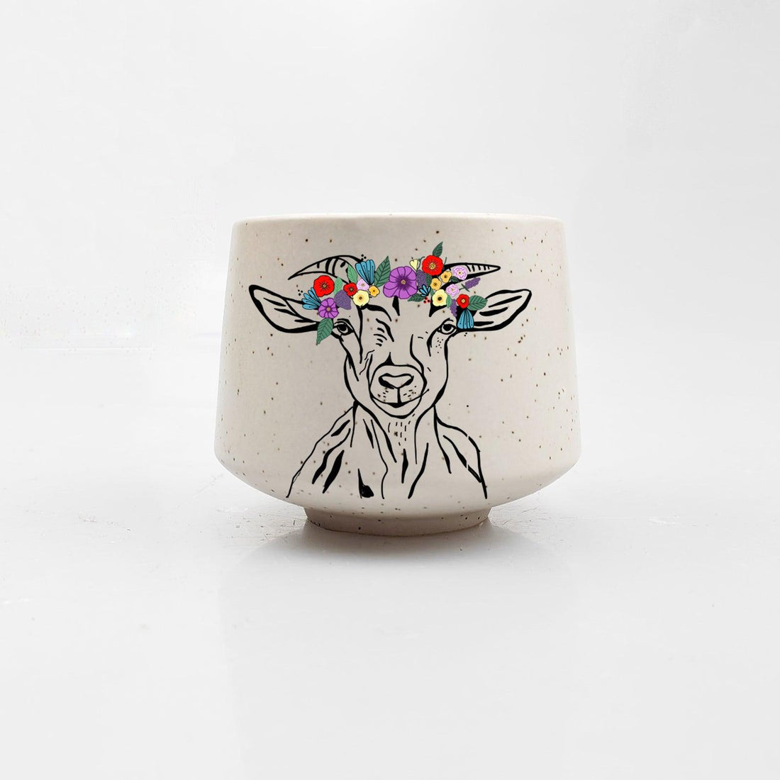 Ceramic pot with a goat illustration and floral crown on a white background