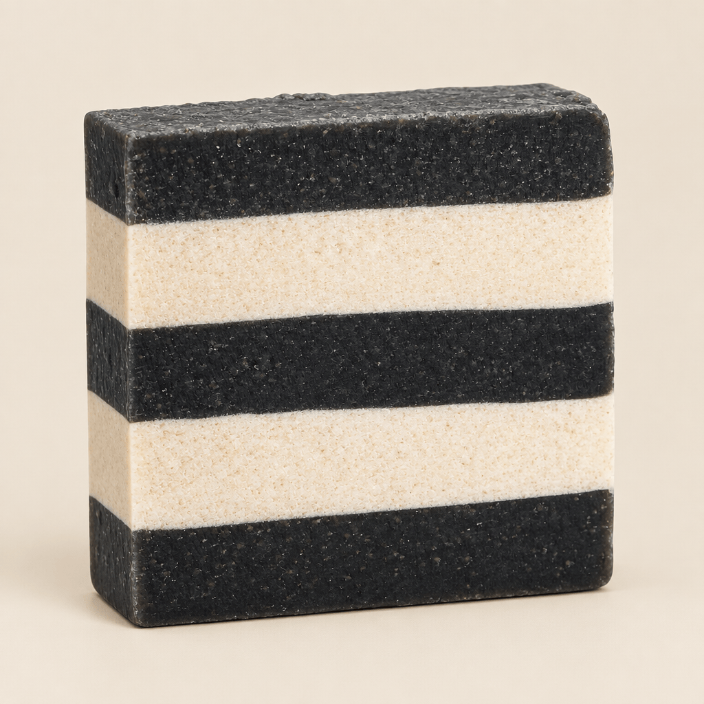 Bar of soap with black and white stripes on a white background
