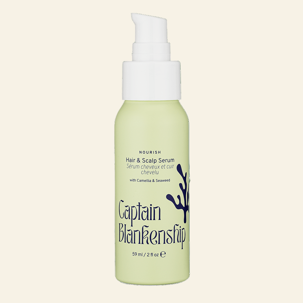 Captain Blankenstien hair and scalp serum bottle on a light beige background