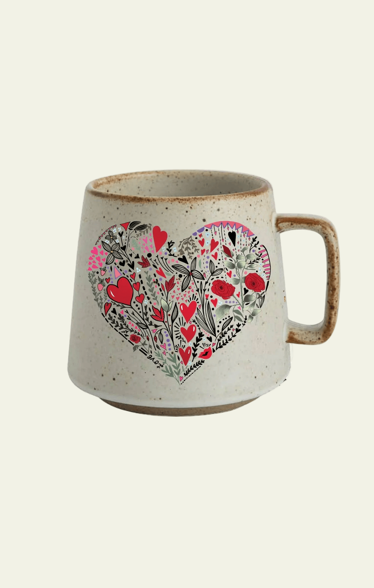 Ceramic mug with a decorative heart design on a white background