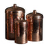 Set of three copper canisters with lids on a white background