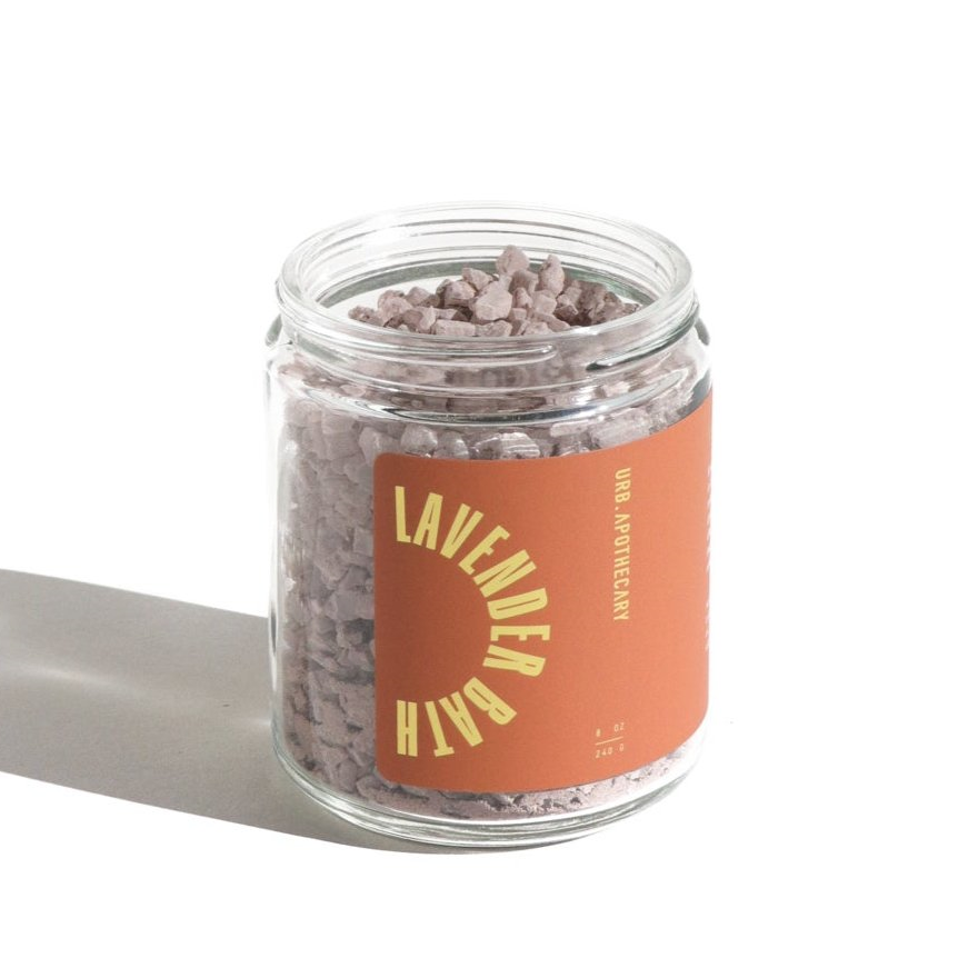 Jar of lavender bath salts with a label on a white background