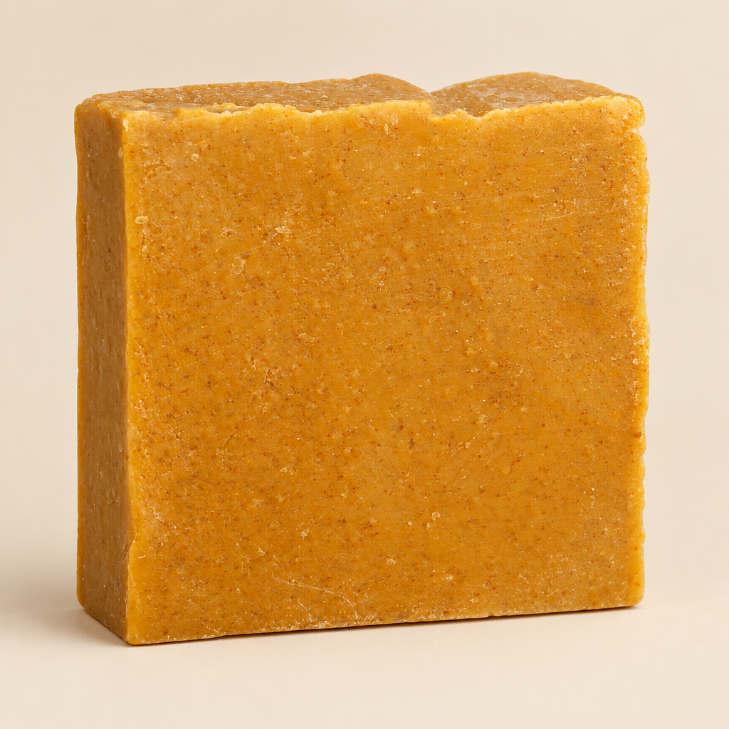 Bar of brown soap on a white background