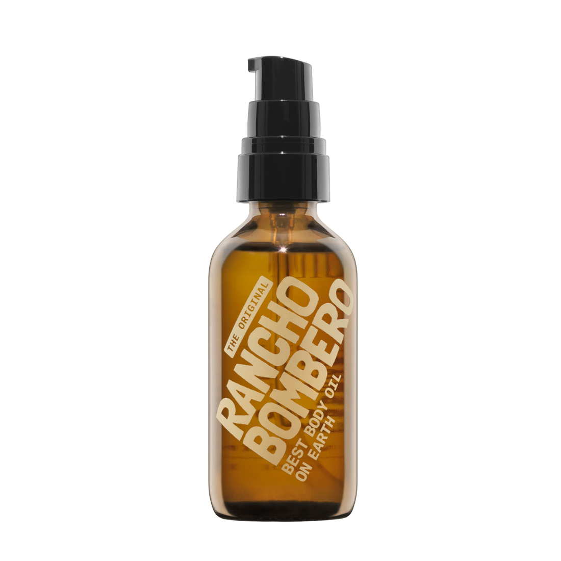 An amber glass pump bottle of Rancho Bombero Best Body Oil with a black pump dispenser and gold lettering, isolated on a white background.