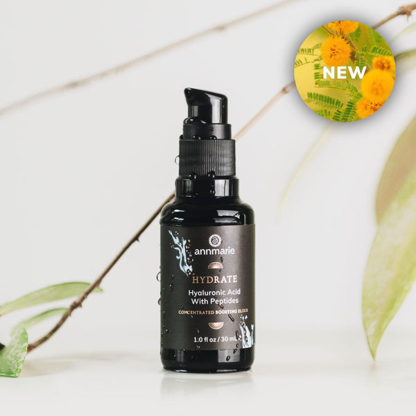 Black bottle of Annmarie Skin Care with text on a white background