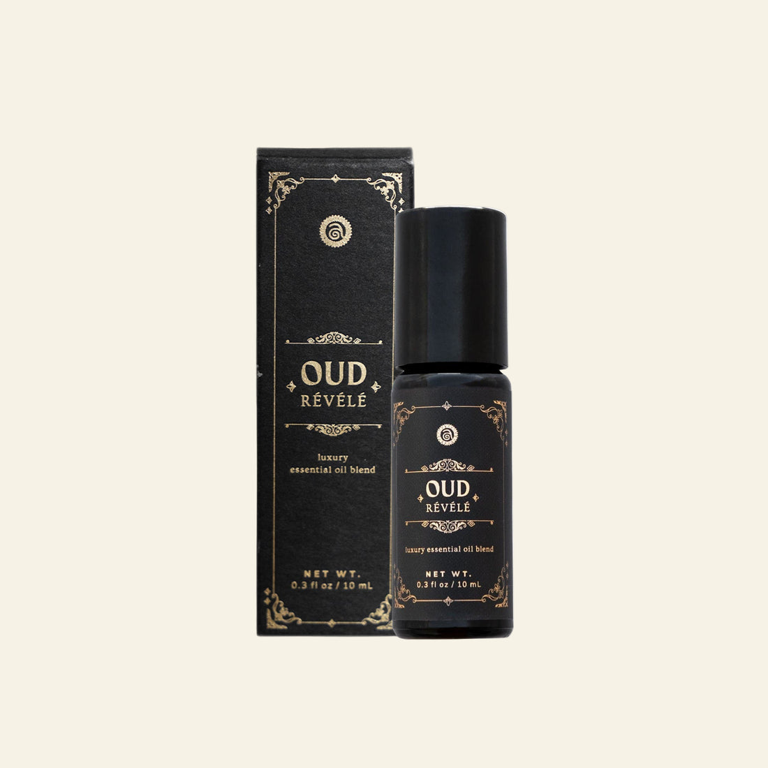 Oud Revele essential oil bottle and packaging on a white background
