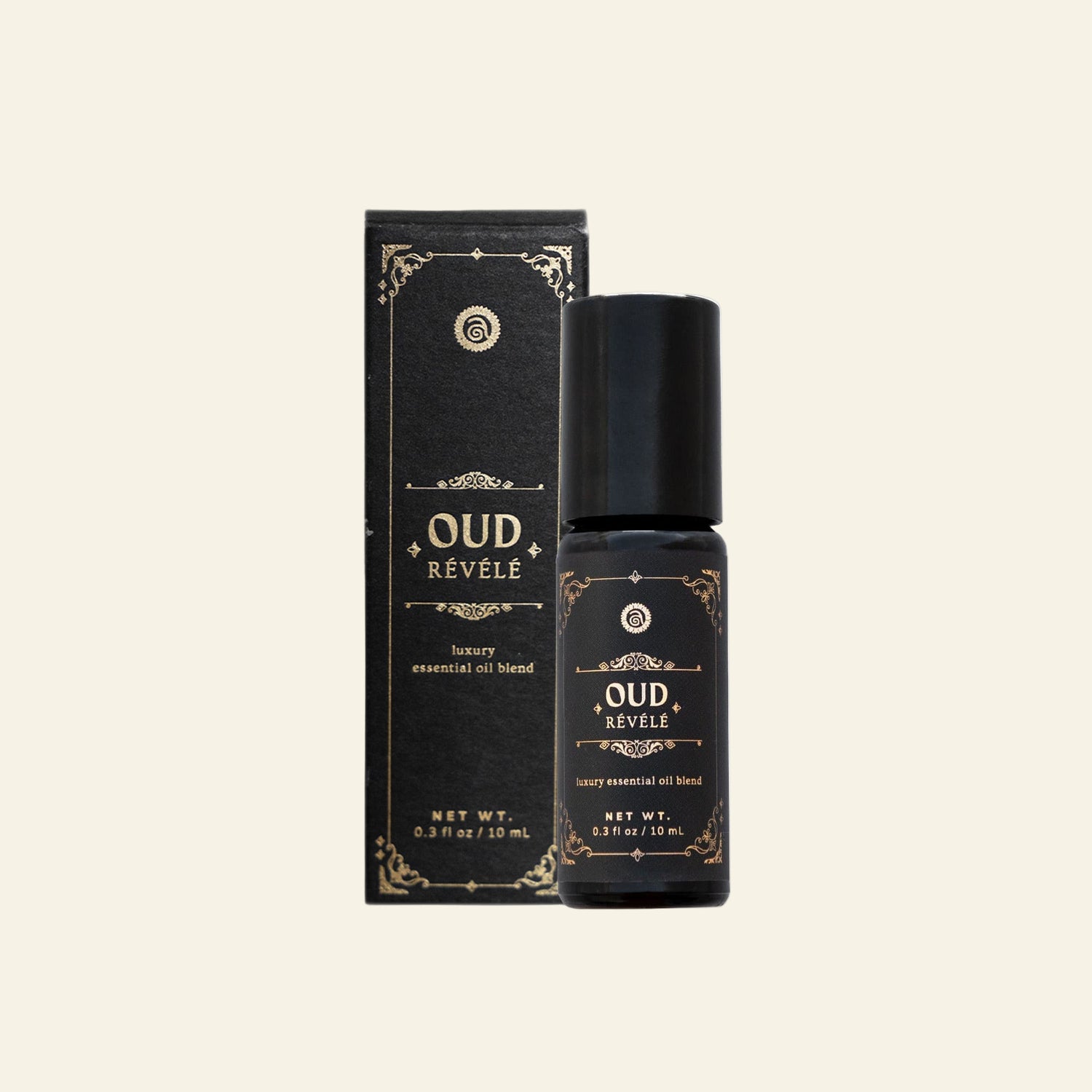 Oud Revele essential oil bottle and packaging on a white background