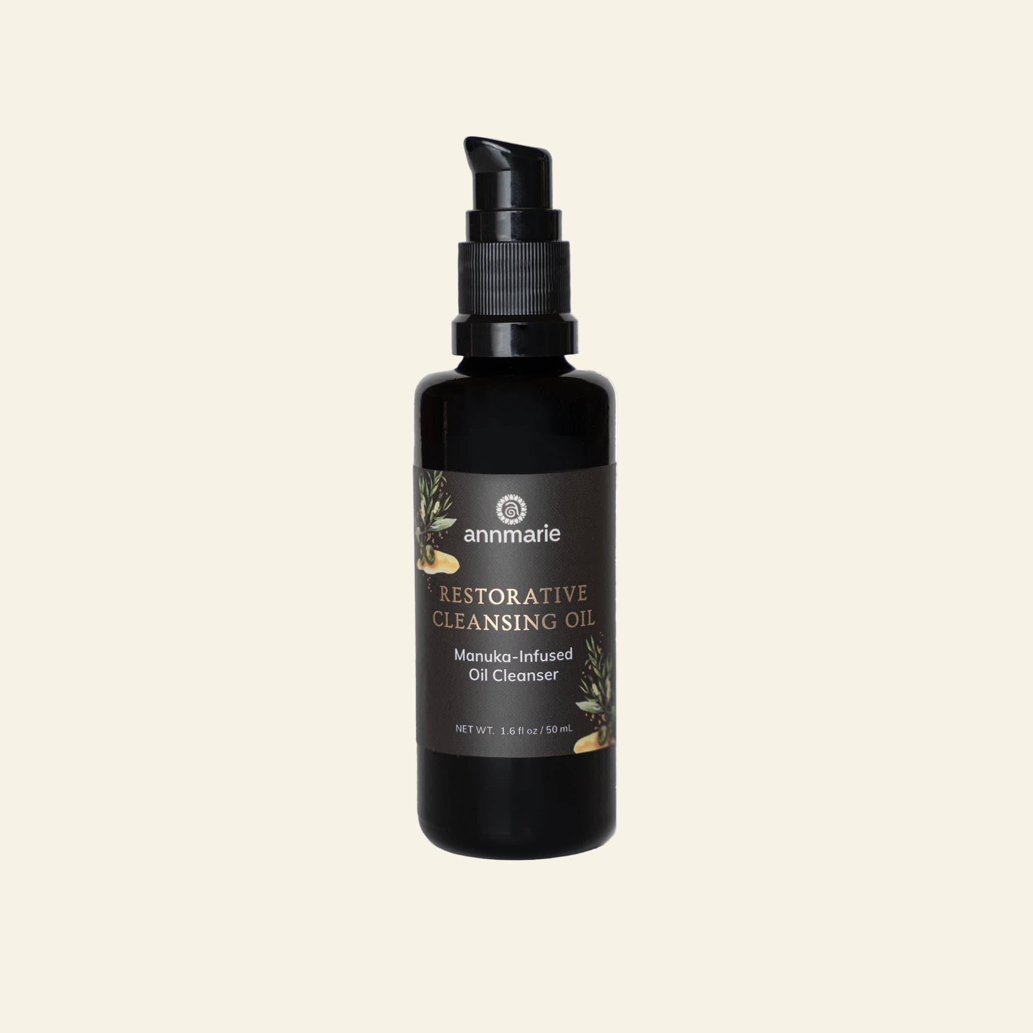 Black bottle of Annmarie Restorative Cleansing Oil on a white background