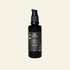 Black bottle of Annmarie Restorative Cleansing Oil on a white background