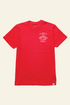 A red short-sleeve crewneck t-shirt with a white circular graphic on the left chest reading &