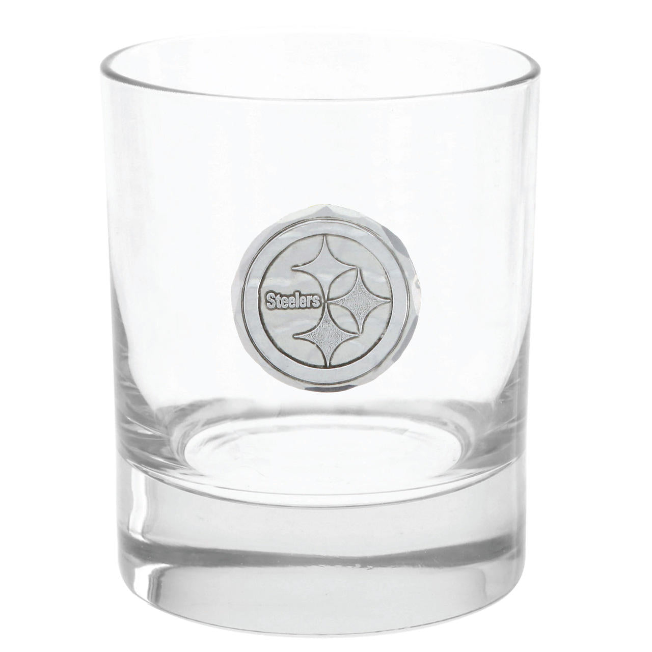 Clear glass with a metallic emblem on a white background