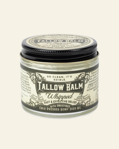Tallow Balm jar with black and white label on a white background