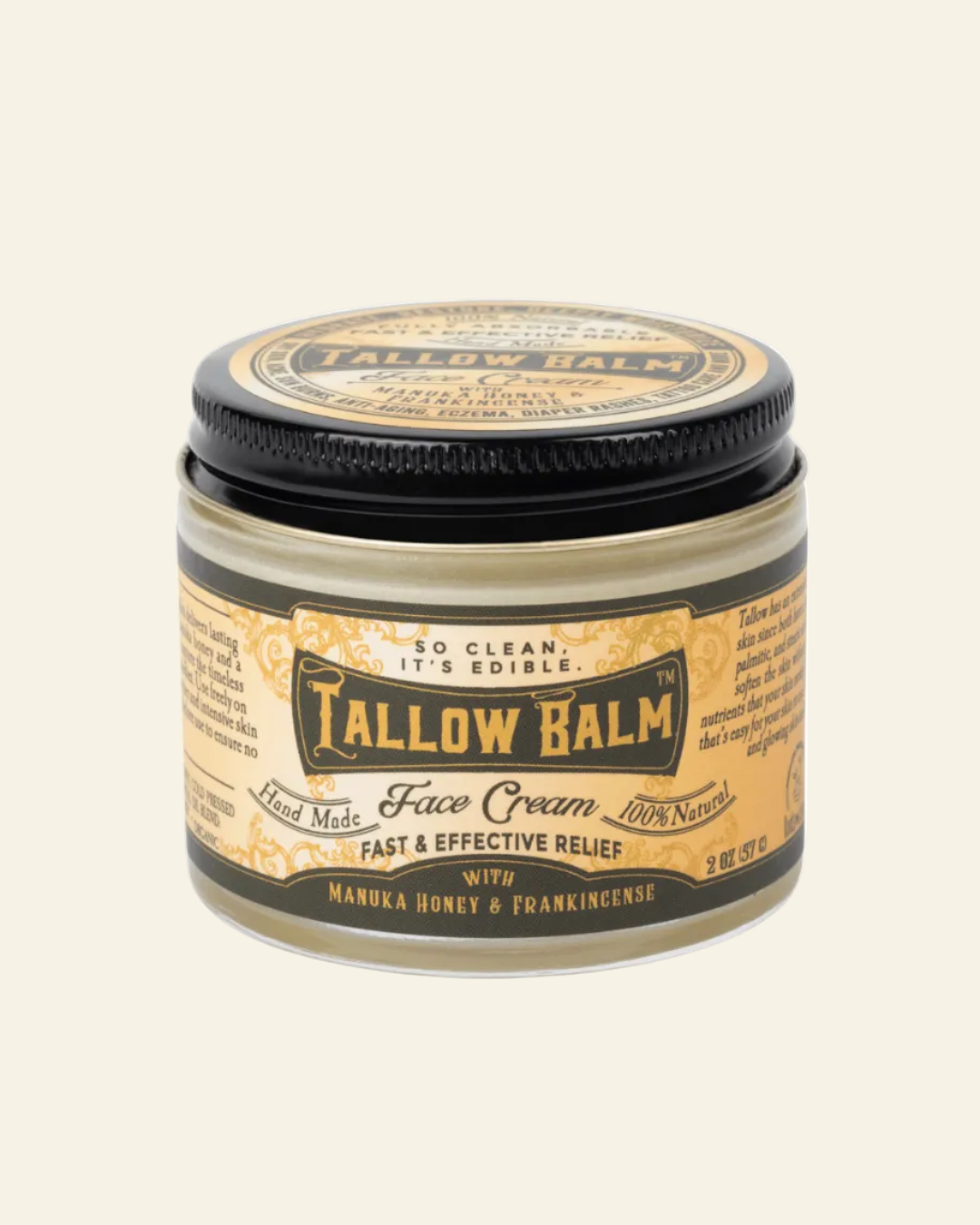Tallow Balm face cream jar with black and gold label on a white background