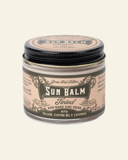 Sun Balm jar with black lid on a white background