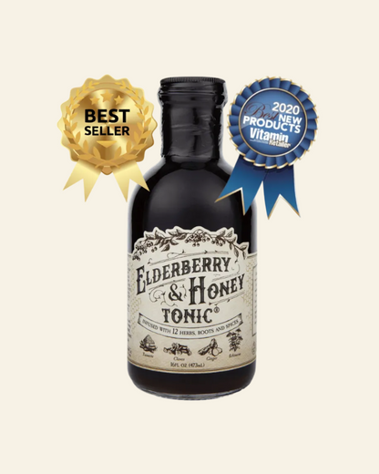 Bottle of Elderberry &amp; Honey Tonic with awards on a white background