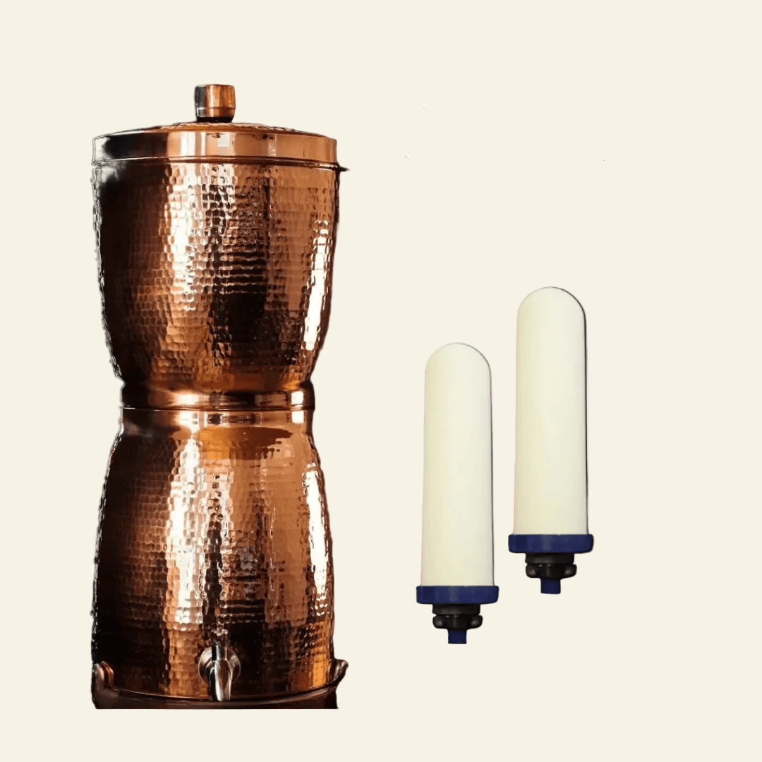 Copper filtration system with two ceramic filters on a beige background, labeled &