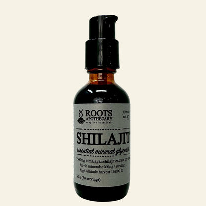 Bottle of Shilajit with Roots Apothecary label on a white background