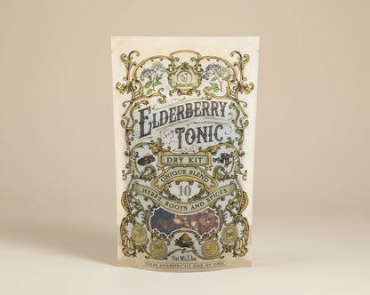 Elderberry Tonic dry kit packaging with decorative elements on a beige background