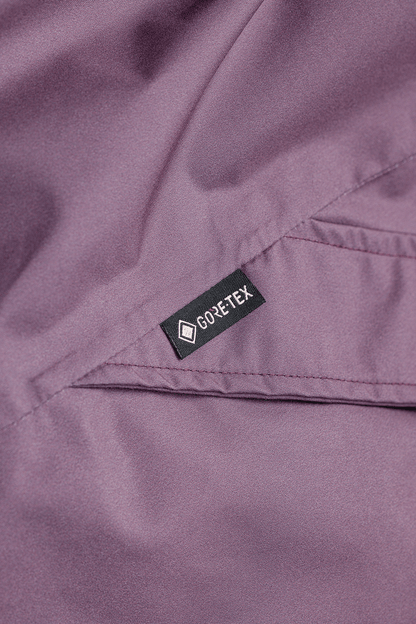 Gore-Tex label on a purple fabric surface